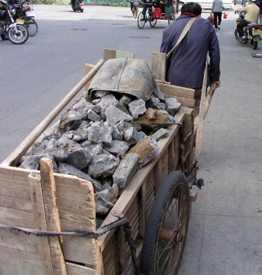 man hauls stones.jpg